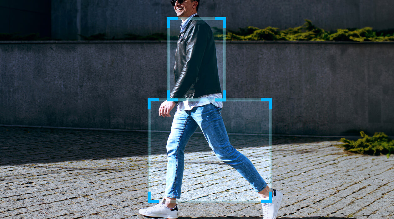 female wearing a face mask and successfully authenticating with facial recognition